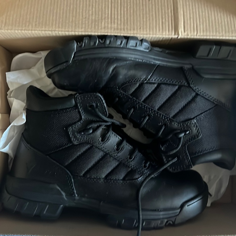 Used size 7.5 men 9 wmns Bates tactical boots